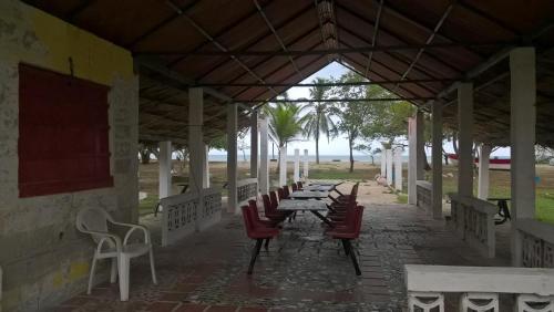 Restaurant, MAR SERENO Recinto Natural Casa Museo MERY LORA de CIFUENTES Condominio de Cabanas frente al MAR in Covenas Restaurant, MAR SERENO Recinto Natural Casa Museo MERY LORA de CIFUENTES Condominio de Cabanas frente al MAR in Covenas