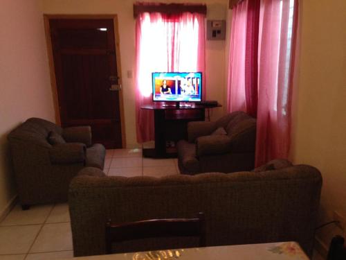 Shared lounge/TV area, Elizabeth Enchantments in La Ceiba Shared lounge/TV area, Elizabeth Enchantments in La Ceiba