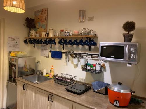 Kitchen, Backpacker 41 Hostel - Kaohsiung in Lingya District Kitchen, Backpacker 41 Hostel - Kaohsiung in Lingya District