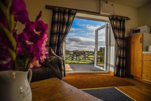 Erkély/terasz, The Hideaway with hot tub in Chathill Erkély/terasz, The Hideaway with hot tub in Chathill