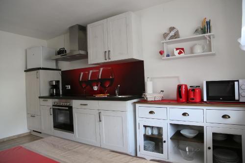 Kitchen, Ferienwohnung Memmel in Sulzfeld (Rhon-Grabfeld) Kitchen, Ferienwohnung Memmel in Sulzfeld (Rhon-Grabfeld)