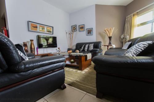 Shared lounge/TV area, Bilene Beach House in Bilene Shared lounge/TV area, Bilene Beach House in Bilene