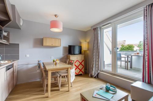 sala de TV, Residence Pierre & Vacances La Petite Venise in Colmar sala de TV, Residence Pierre & Vacances La Petite Venise in Colmar