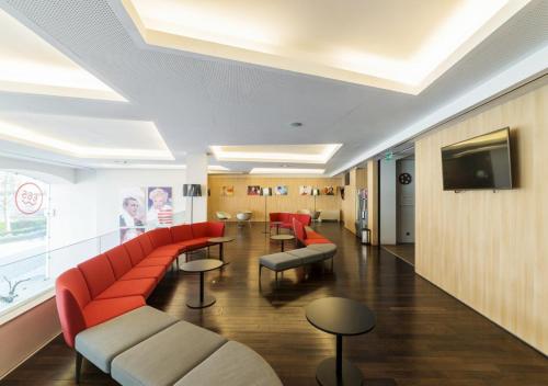 صالة مشتركة/ منطقة التلفزيون, فندق موف بورتو سنترو (Moov Hotel Porto Centro) in بورتو صالة مشتركة/ منطقة التلفزيون, فندق موف بورتو سنترو (Moov Hotel Porto Centro) in بورتو