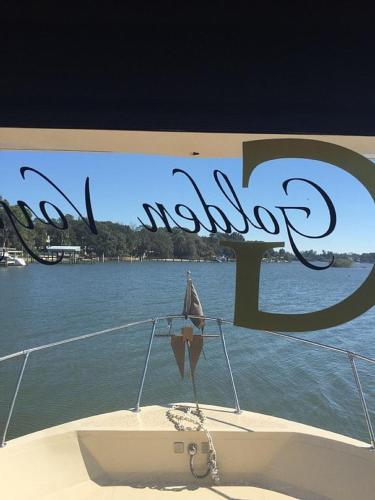 Dolphin Delight 47 Foot Houseboat on the Gulf, at Dock With Gulf View in Tarpon Springs, rental of e in Holiday (FL) Dolphin Delight 47 Foot Houseboat on the Gulf, at Dock With Gulf View in Tarpon Springs, rental of e in Holiday (FL)