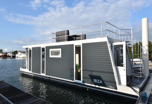 Pohled zvenku, Tiny floating house Ibiza in Heugem Pohled zvenku, Tiny floating house Ibiza in Heugem