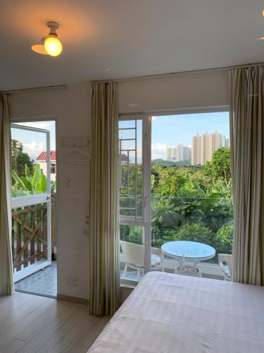 Balcony/terrace, City Oasis Guesthouse near Citygate Outlets Balcony/terrace, City Oasis Guesthouse near Citygate Outlets