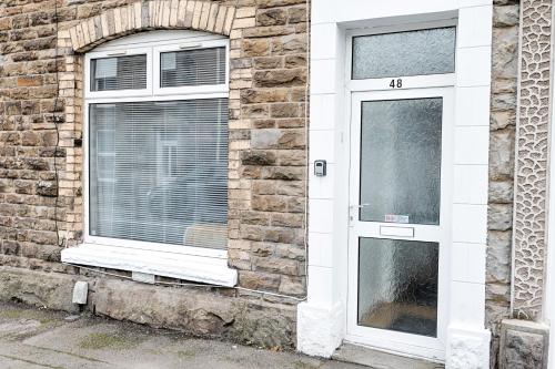 Entree, Contractor Base - Parking - TVs in All Rooms in Morriston Entree, Contractor Base - Parking - TVs in All Rooms in Morriston