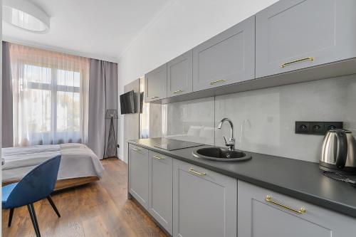 Cozinha, Krzywa Kamienica Apartamenty in Polesie Cozinha, Krzywa Kamienica Apartamenty in Polesie