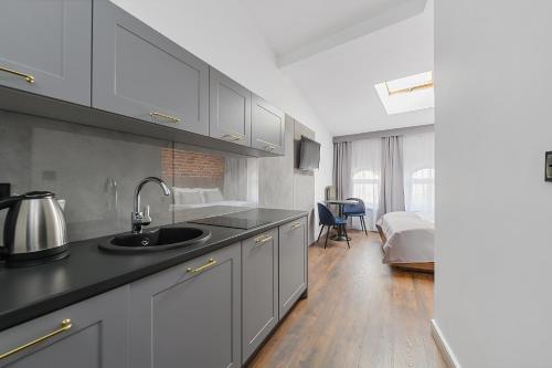 Cozinha, Krzywa Kamienica Apartamenty in Polesie Cozinha, Krzywa Kamienica Apartamenty in Polesie