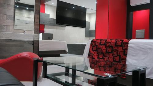 Shared lounge/TV area, Motel Boutique Xpress in Ensenada Shared lounge/TV area, Motel Boutique Xpress in Ensenada