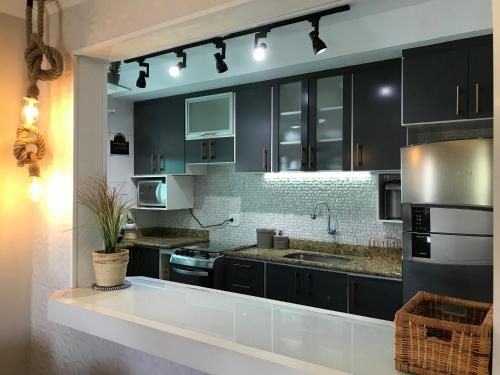 Kitchen, Apartamento moderno e com clube privativo in Baixo Grande Kitchen, Apartamento moderno e com clube privativo in Baixo Grande