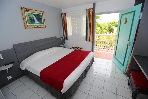 Guestroom, Hotel La Maison Creole in Gosier Guestroom, Hotel La Maison Creole in Gosier