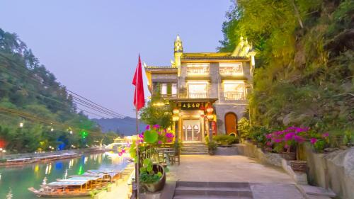This photo about Fenghuang Tujia Ethnic Minority River View Hotel shared on HyHotel.com