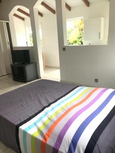 Lit, Appartement charmant à Capesterre-Belle-Eau avec jardin 36 m². (Appartement charmant a Capesterre-Belle-Eau avec jardin 36 m².) in Capesterre Belle Eau Lit, Appartement charmant à Capesterre-Belle-Eau avec jardin 36 m². (Appartement charmant a Capesterre-Belle-Eau avec jardin 36 m².) in Capesterre Belle Eau