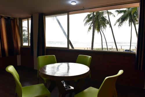 Balcony/terrace, Glucklich Beach Cottages in Koteshwar Balcony/terrace, Glucklich Beach Cottages in Koteshwar
