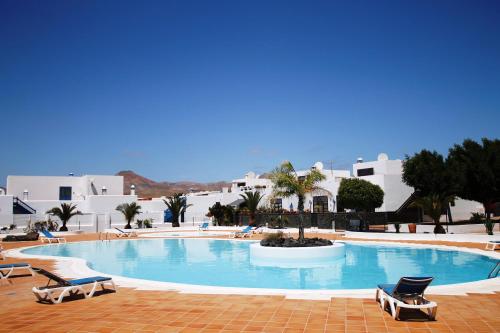 Zwembad, Alojamiento Vacacional con balcón La Vela (Alojamiento Vacacional con balcon La Vela) in Costa Calero Zwembad, Alojamiento Vacacional con balcón La Vela (Alojamiento Vacacional con balcon La Vela) in Costa Calero