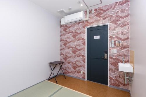 This photo about Iyasu Hostel Higashikawa shared on HyHotel.com