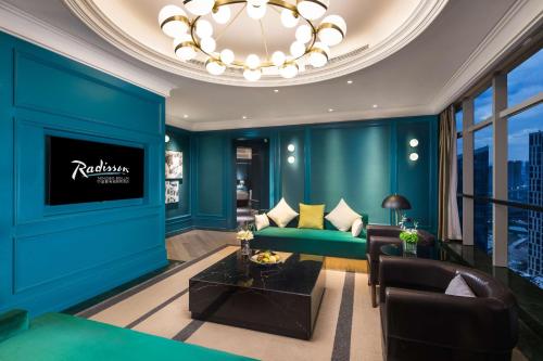 Shared lounge/TV area, Radisson Ningbo Beilun in Ningbo Shared lounge/TV area, Radisson Ningbo Beilun in Ningbo
