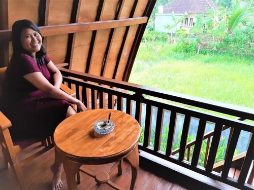 balkon/terras, Telagamas Guest House in Gianyar balkon/terras, Telagamas Guest House in Gianyar