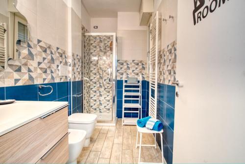 Bagno, CaseOspitali - CASA AZZURRA incantevole bilocale con giardino in Cernusco Sul Naviglio Bagno, CaseOspitali - CASA AZZURRA incantevole bilocale con giardino in Cernusco Sul Naviglio