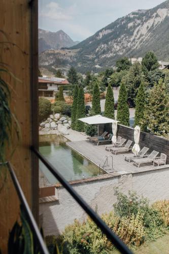 Úszómedence, Hotel Hinteregger in Matrei in Osttirol Úszómedence, Hotel Hinteregger in Matrei in Osttirol