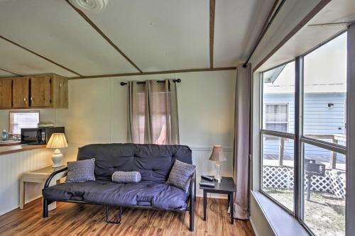 Charming Silver Springs Cabin with Forest Views! in Ocklawaha Charming Silver Springs Cabin with Forest Views! in Ocklawaha