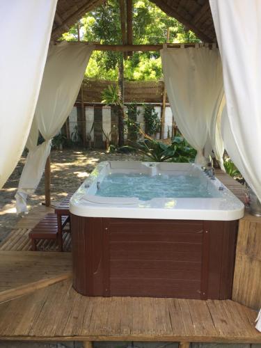 Hot tub, AMAMI GARDEN SPA near Talipanan Beach Hot tub, AMAMI GARDEN SPA near Talipanan Beach