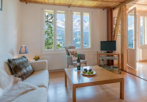 Shared lounge/TV area, Chalet Hunnenfluh in Gundlischwand Shared lounge/TV area, Chalet Hunnenfluh in Gundlischwand