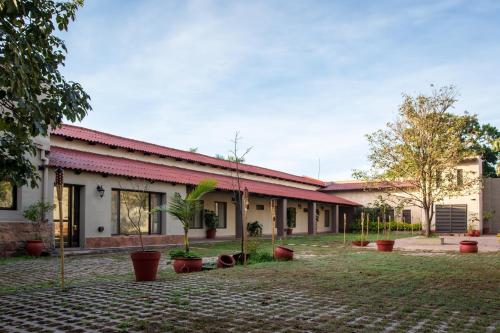 Градина, Hotel del Ingenio in Либертадор Хенерал Сан Мартин Градина, Hotel del Ingenio in Либертадор Хенерал Сан Мартин