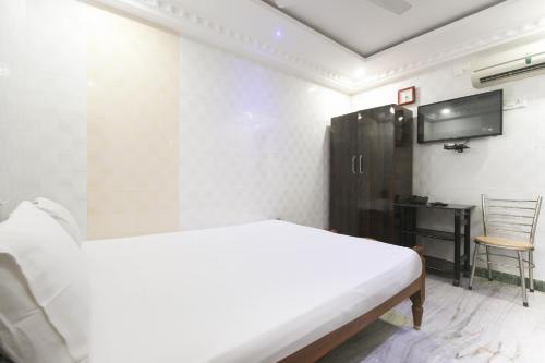 This photo about SPOT ON 49443 Universal Inn shared on HyHotel.com