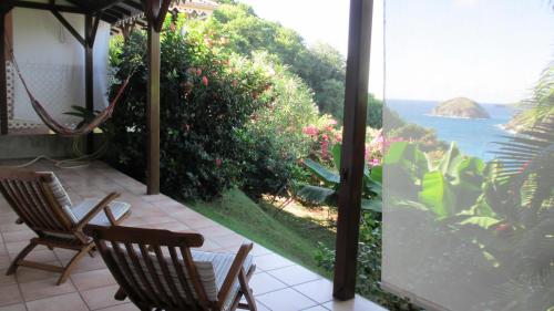 Balcony/terrace, Anse Figuier Gites de France in Terre-de-Haut Balcony/terrace, Anse Figuier Gites de France in Terre-de-Haut