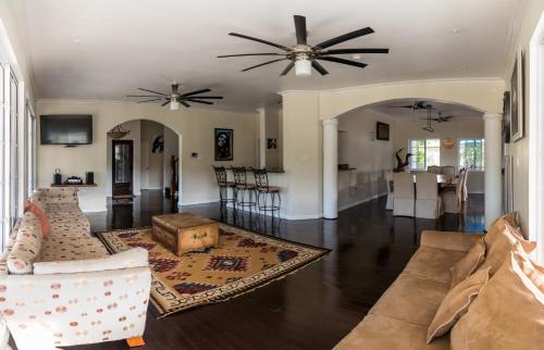 Shared lounge/TV area, Blue Paloma Bed & Breakfast in Lucea Shared lounge/TV area, Blue Paloma Bed & Breakfast in Lucea