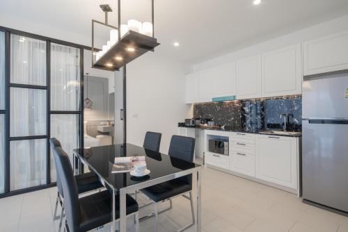 Kitchen, Palmyrah Surin Beach Residence in Surin Kitchen, Palmyrah Surin Beach Residence in Surin