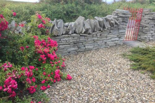 Red Stonecutters Cottage, Doolin in Doonnagore Red Stonecutters Cottage, Doolin in Doonnagore