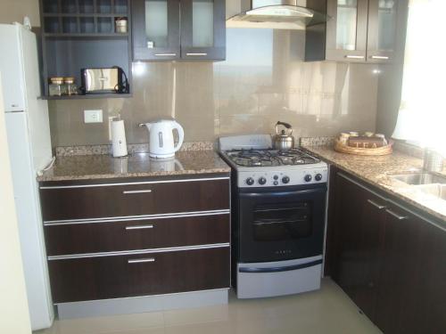 مطبخ, Altos del Lago departamentos in ايل كالافاتي مطبخ, Altos del Lago departamentos in ايل كالافاتي