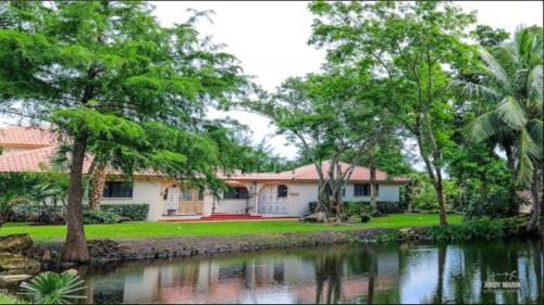 4 Acre Property & Mansion Sleeps 28 “The Hacienda” West Palm Beach