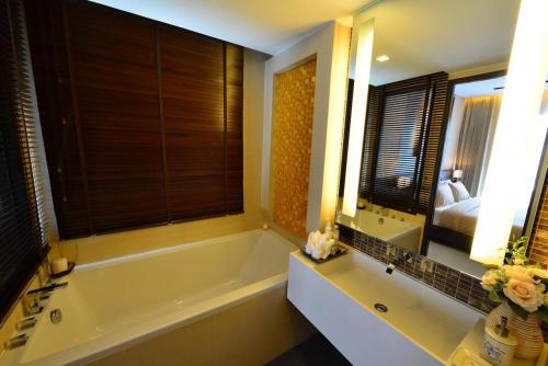 Bathroom, The Charm Resort Phuket in Phuket Bathroom, The Charm Resort Phuket in Phuket