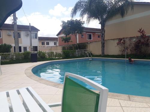 Swimming pool, Casa em Condominio in Vargem Grande Swimming pool, Casa em Condominio in Vargem Grande