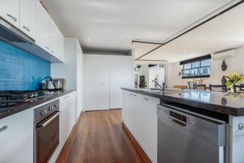 Kitchen, StayCentral - Fitzroy Converted Warehouse Penthouse in Fitzroy Kitchen, StayCentral - Fitzroy Converted Warehouse Penthouse in Fitzroy