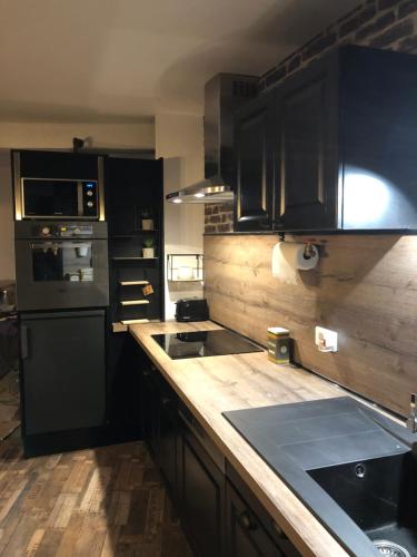 Kitchen, Le velocipede in Aumale Kitchen, Le velocipede in Aumale