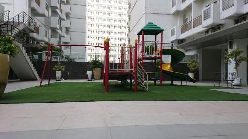 Parque infantil, Sentul Tower Apartment by Kozy Room in Bogor Parque infantil, Sentul Tower Apartment by Kozy Room in Bogor