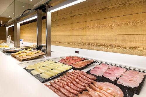 Food and beverages, Hotel Cristiania in Madonna di Campiglio City Center Food and beverages, Hotel Cristiania in Madonna di Campiglio City Center