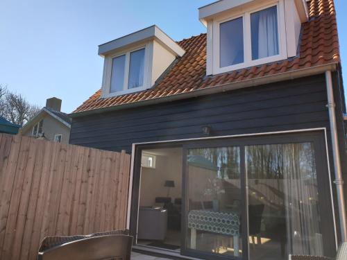A szálláshely kívülről, Bosweg 9a, Comfortabele vakantiewoning, Centrum Zoutelande in Zoutelande A szálláshely kívülről, Bosweg 9a, Comfortabele vakantiewoning, Centrum Zoutelande in Zoutelande
