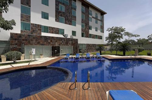 Swimming pool, Holiday Inn Express Villahermosa By IHG in Multiochenta Swimming pool, Holiday Inn Express Villahermosa By IHG in Multiochenta