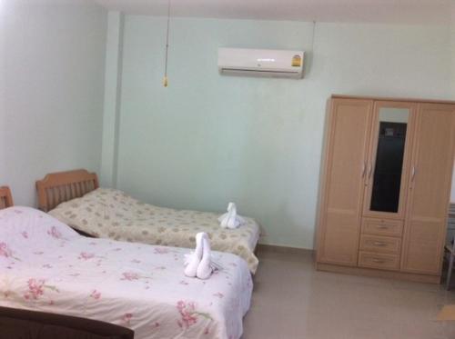 Briya Beachfront Residence Family Double Room