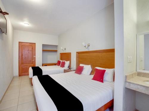 This photo about Capital O Hotel Patzcuaro shared on HyHotel.com