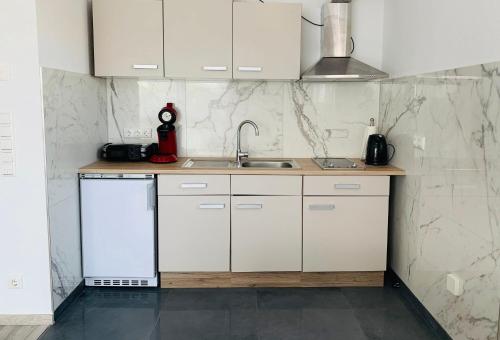 廚房, IG-Apartments in 美因河畔哈特爾斯海姆 廚房, IG-Apartments in 美因河畔哈特爾斯海姆