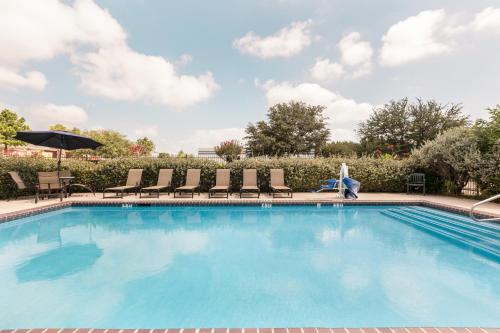 Piscina, Super 8 By Wyndham Grapevine/Dfw Airport Northwest in Dallas (TX) Piscina, Super 8 By Wyndham Grapevine/Dfw Airport Northwest in Dallas (TX)