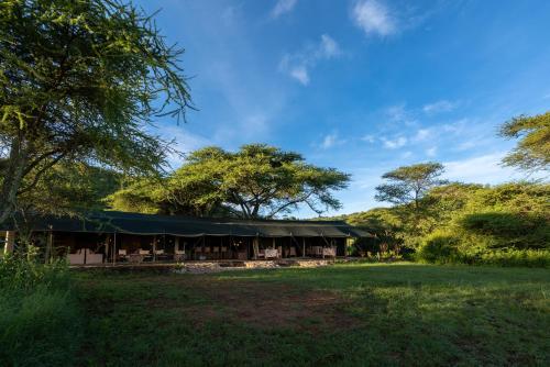 Vista exterior, Serengeti Woodlands Camp in Serengeti Vista exterior, Serengeti Woodlands Camp in Serengeti